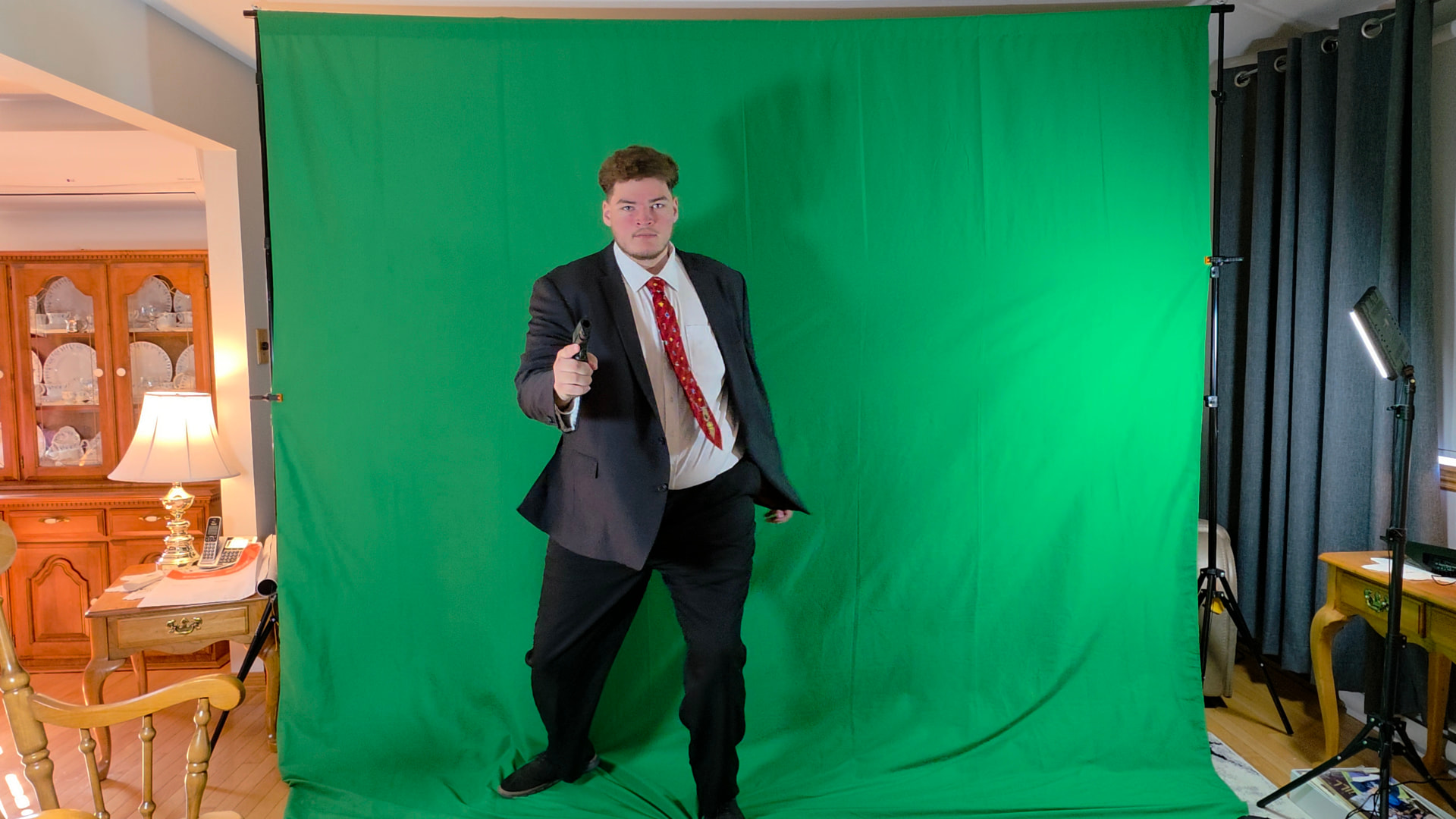 Actor performing in front of a green screen