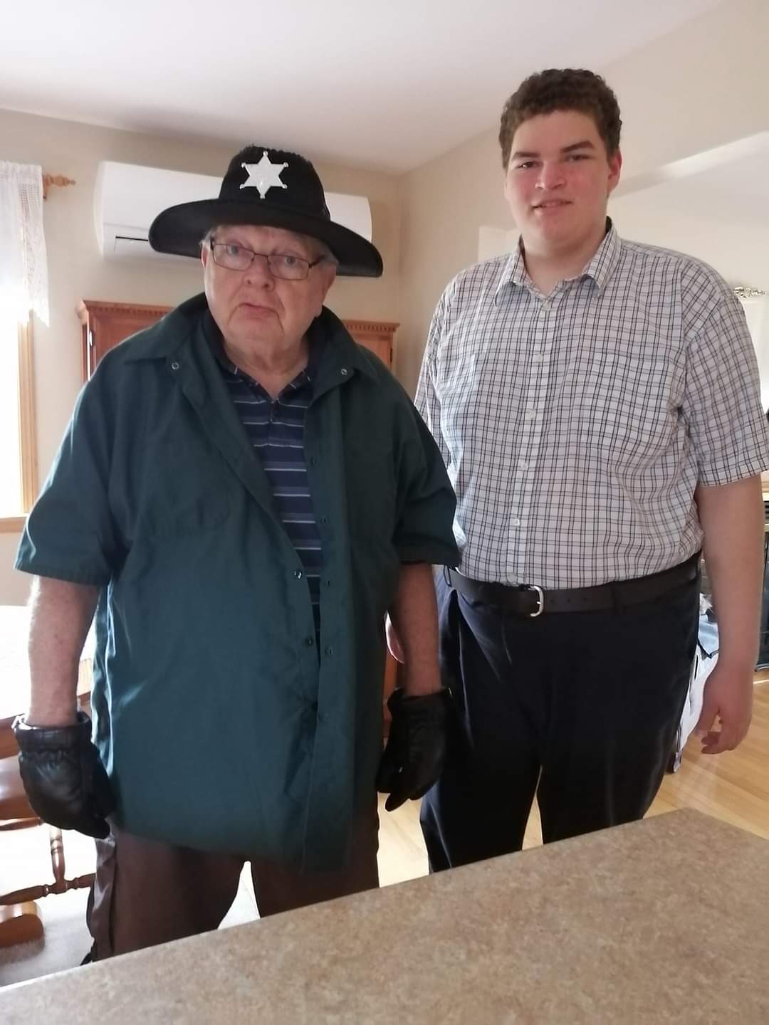 Two performers dressed for a western production