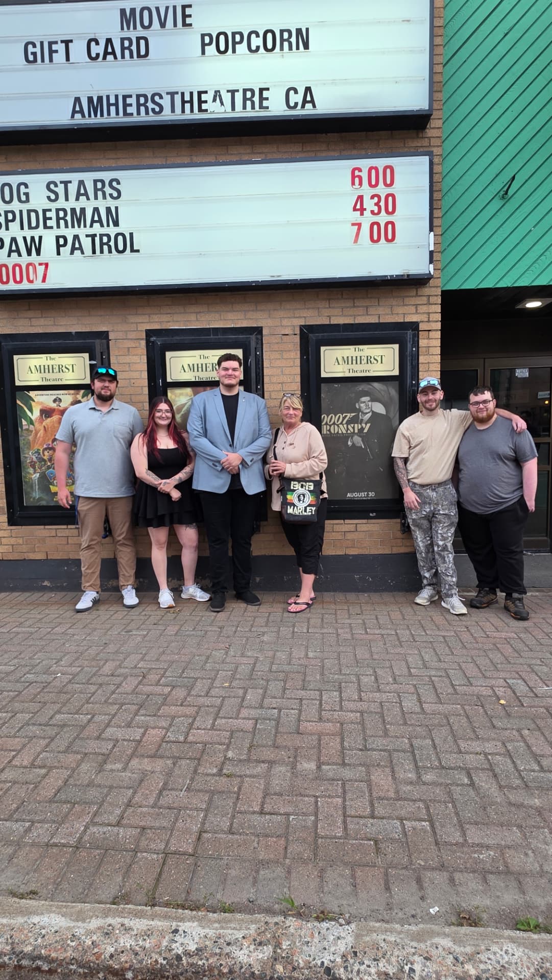 Cast and crew gathered outside the Amherst Theatre for 0007 Ironspy