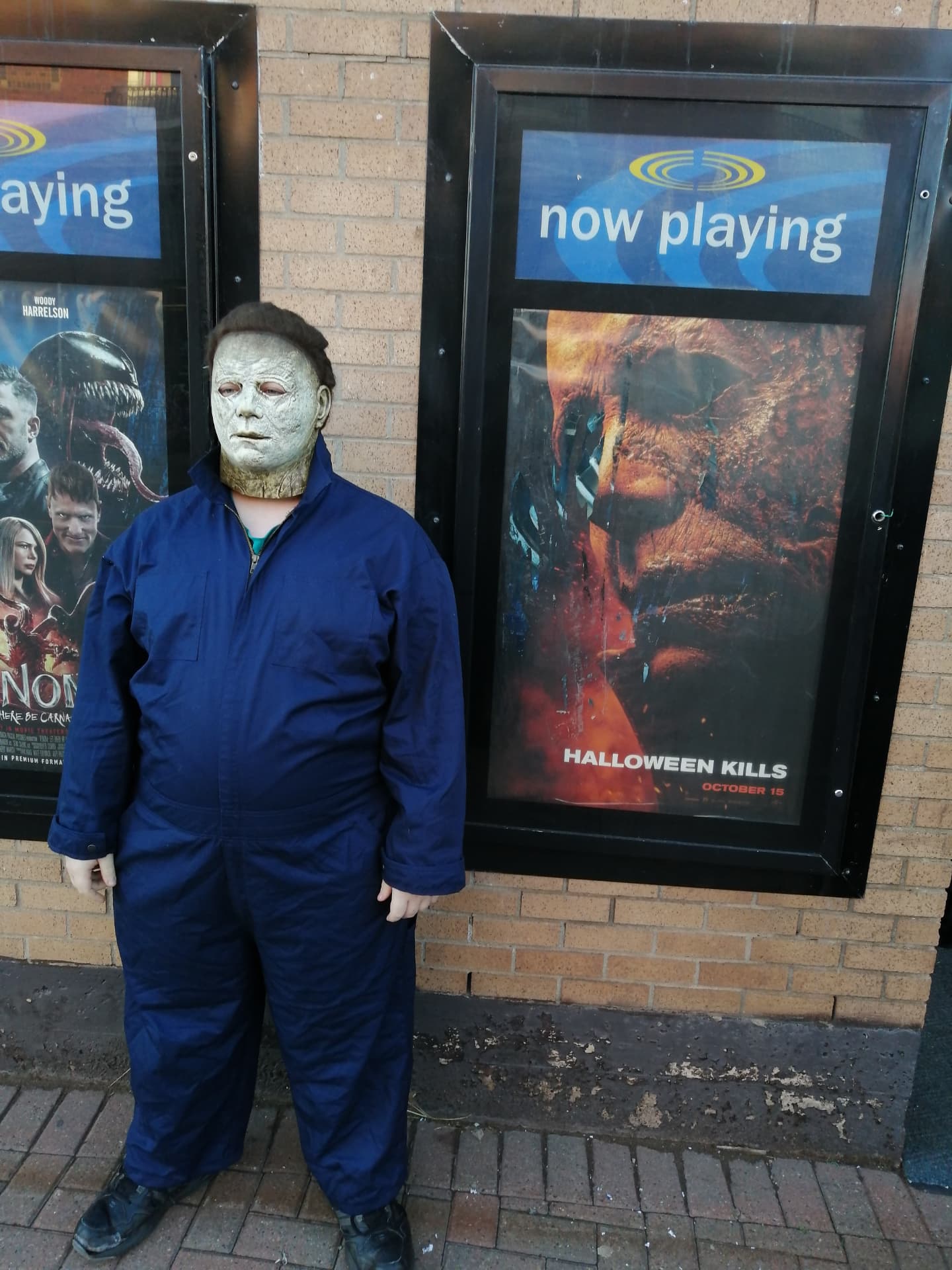 Michael Myers costume outside a cinema during Halloween Kills